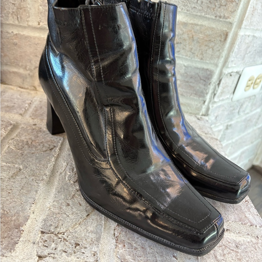 Sleek Black Patent Leather Heeled Boots